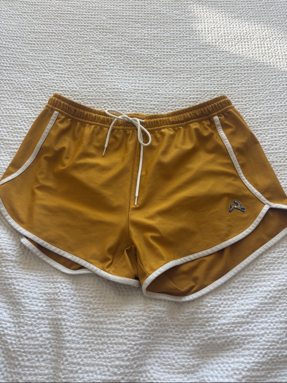 Tracksmith Mustard Yellow Athletic Shorts with White Trim